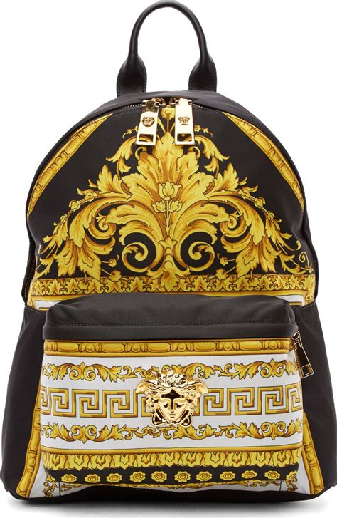 versace backpack black and gold|Versace gold chain bag.